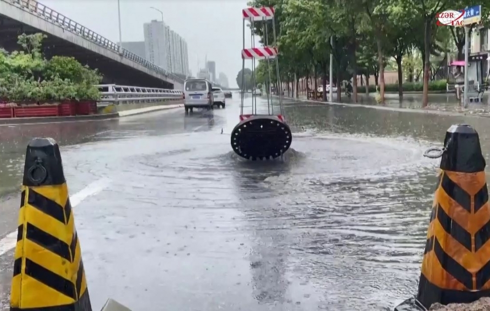 China goes all out to tackle typhoon-induced torrential rain, floods
