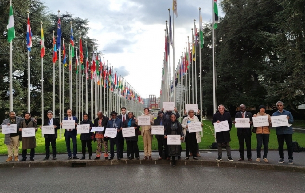 Participants of international conference hold peaceful action against French colonialism in Geneva