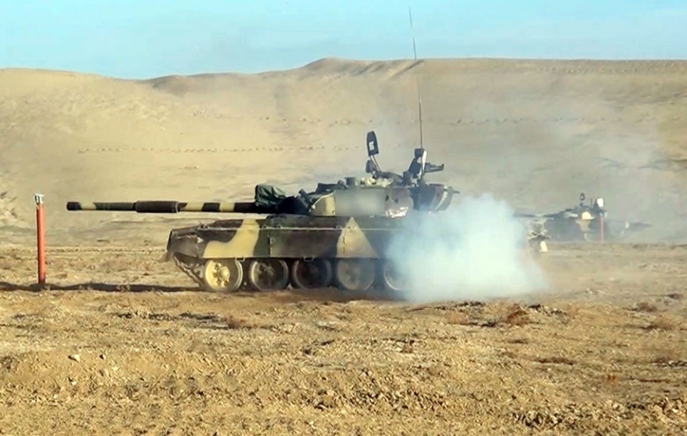 Servicemen are evaluated on driving and firing skills