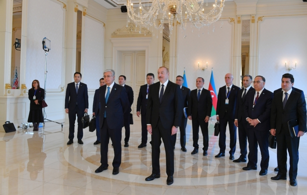 Presidents of Azerbaijan and Kazakhstan watch the ceremony marking the arrival of container train from China's Xi'an terminal to Baku's Absheron station via a video link