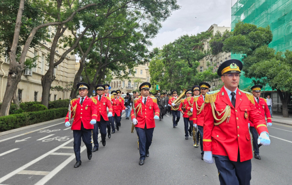 Soldiers marching in parade through Baku in Armed Forces Day celebration
