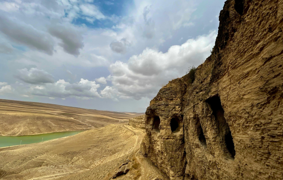 Traces of the past carved in limestone walls – Narimankend Caves